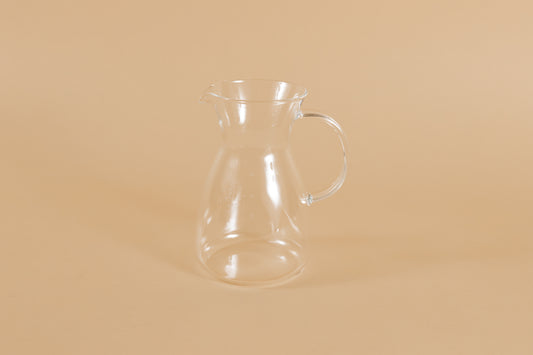 Short all glass coffee decanter with handle and hourglass curve.