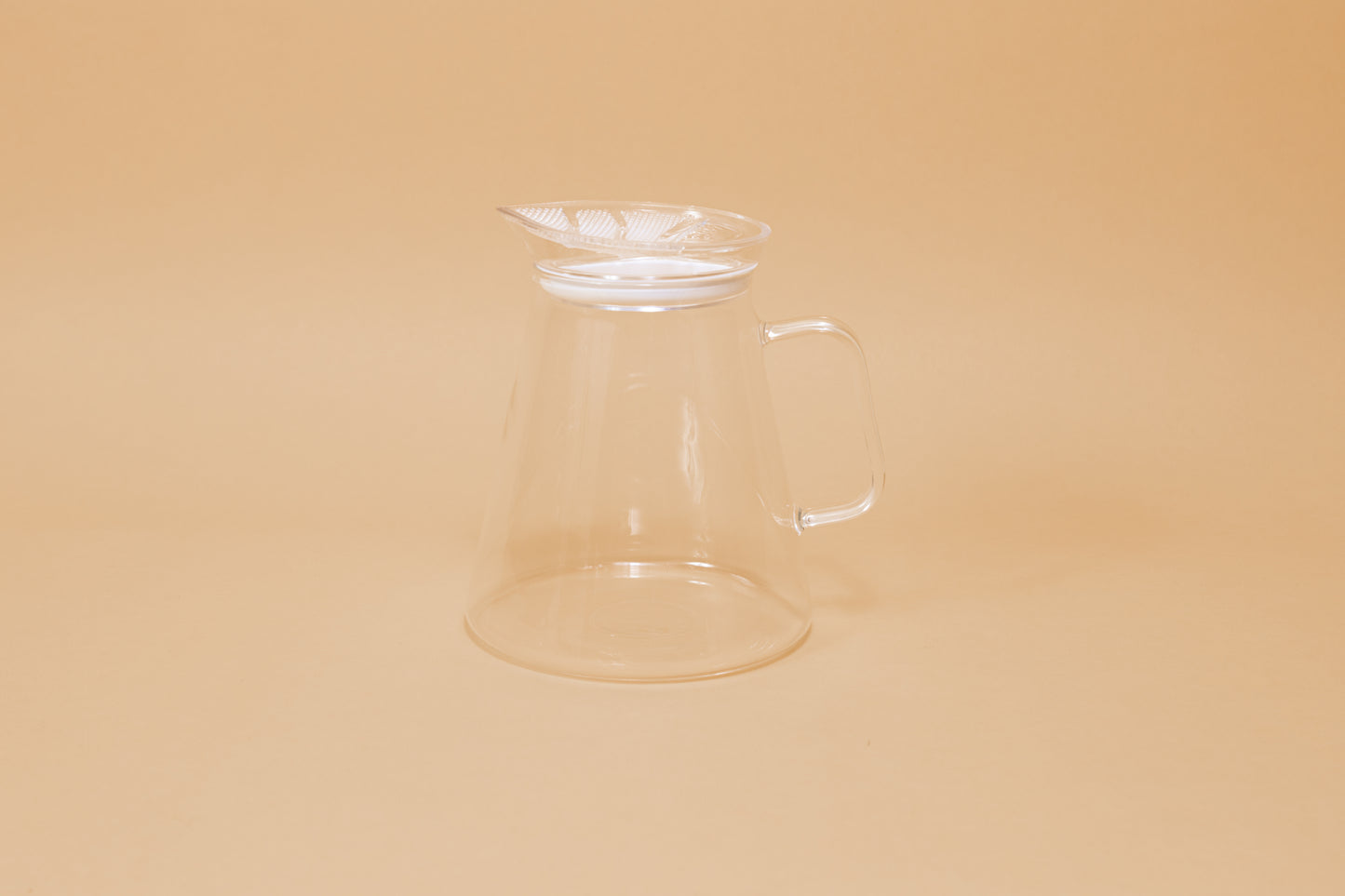 Clear all glass server with handle and clear plastic lid with perforations and white gasket