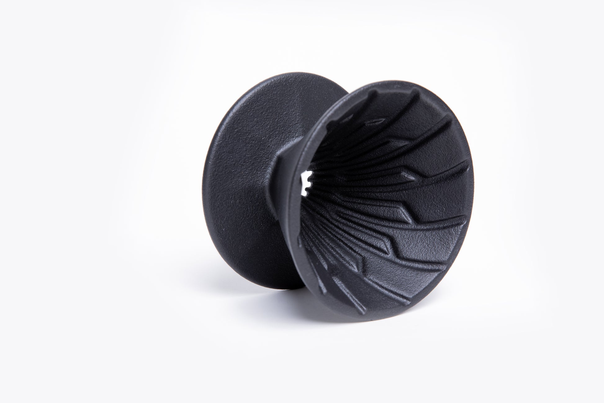 matte black dripper cone with interior ribbing on a black background