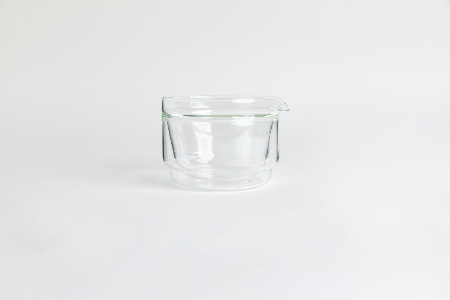 Double-walled glass cup. set on a white background