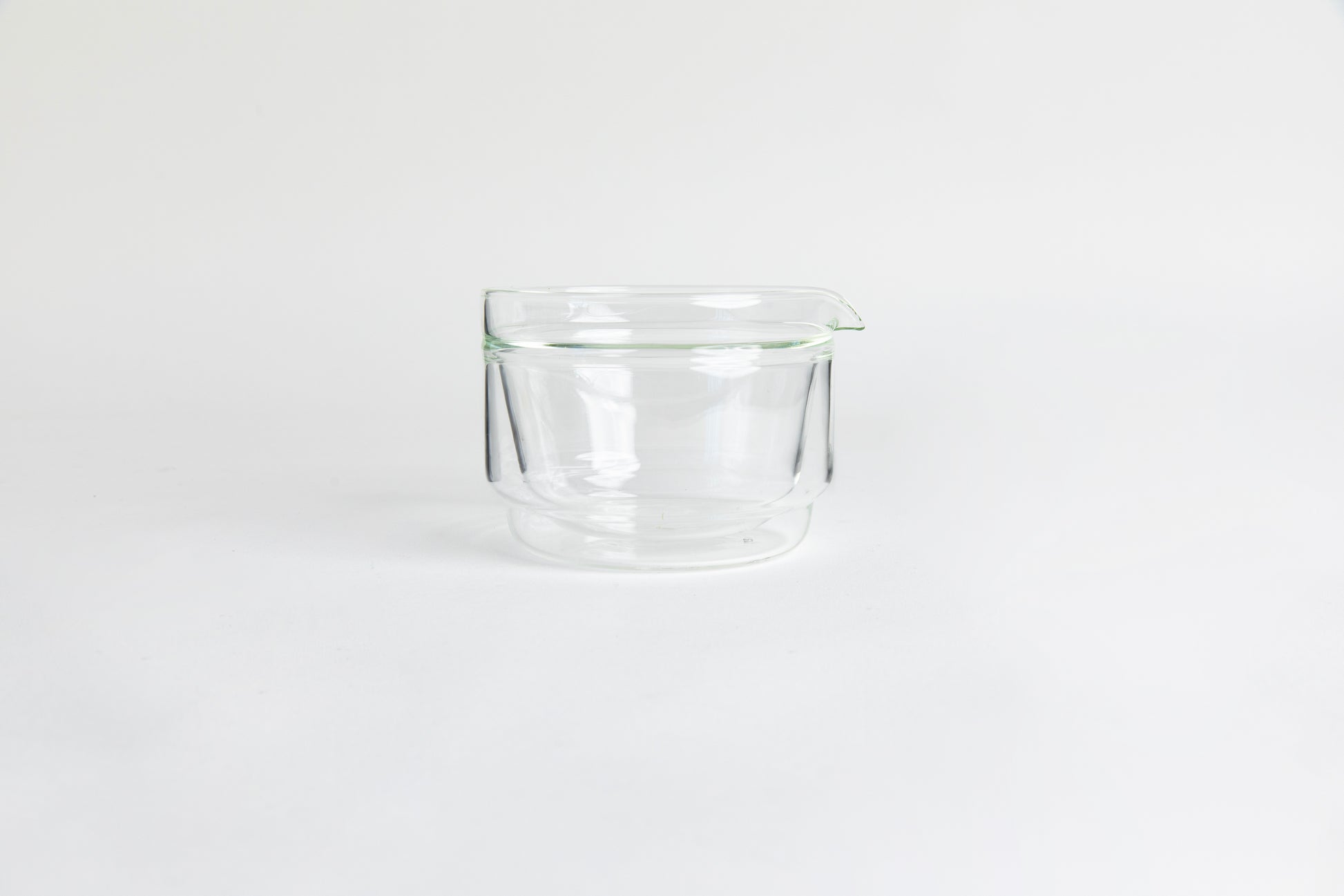 Double-walled glass cup. set on a white background