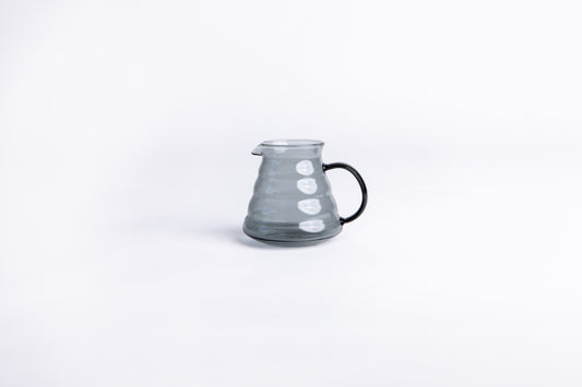 clear gray beehive pitcher on white background