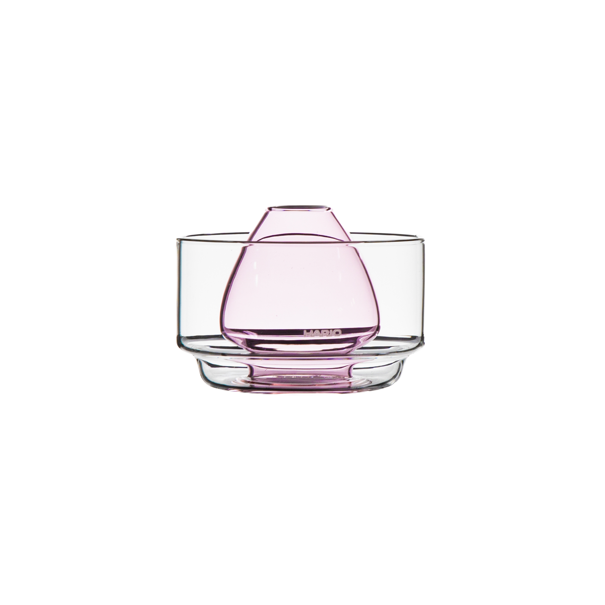 clear glass chasen stand bowl for resting a bamboo matcha whisk and soaking its bristles to soften them, featuring a raised center and pink rounded glass design. on a white background