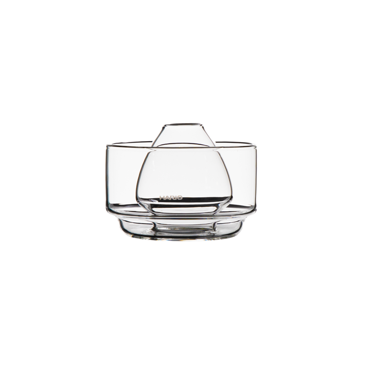 clear glass chasen stand bowl for resting a bamboo matcha whisk and soaking its bristles to soften them, featuring a raised center and rounded glass design. on a white background