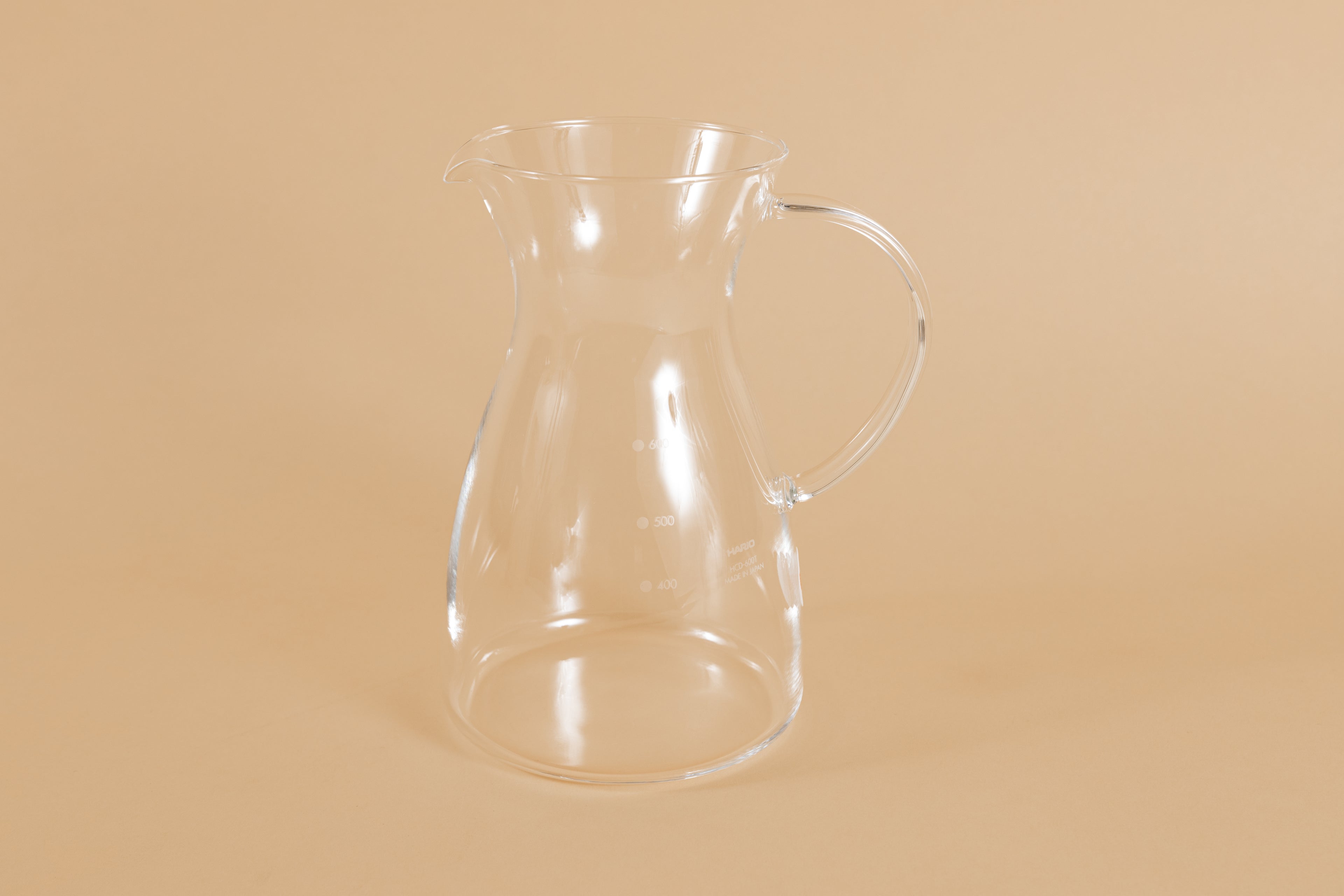 All glass coffee decanter with handle and hourglass curve.