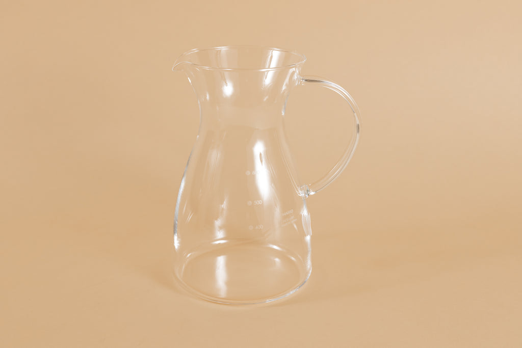 All glass coffee decanter with handle and hourglass curve.