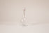 Tear drop shaped glass diffuser with natural wood wand and knob.
