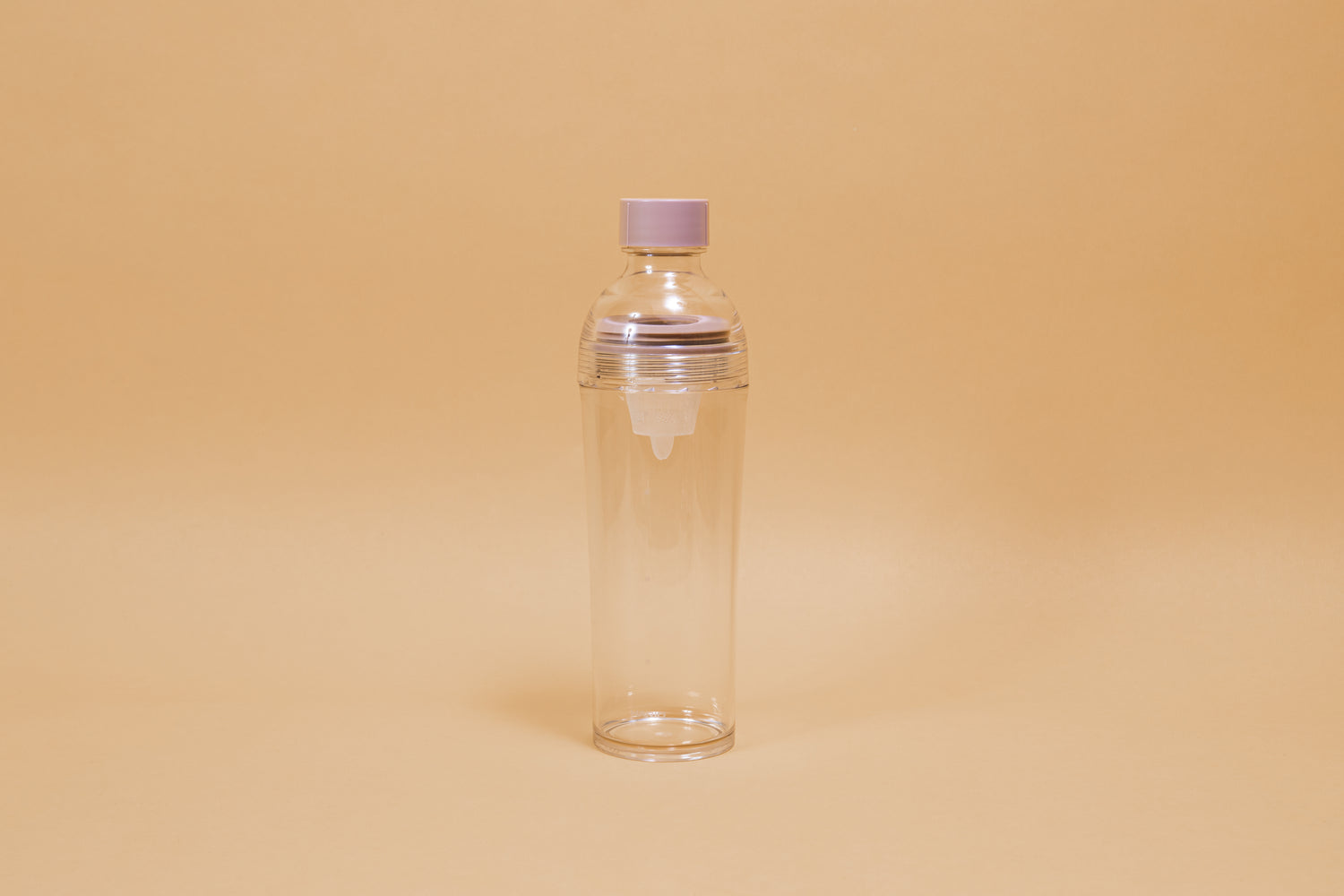 Clear plastic bottle with removable nylon tea strainer and pink plastic cap.