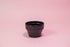 All black ceramic tapered cupping bowl with inner ridge.
