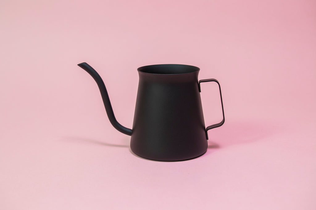 All black metal kettle with flared top, gooseneck, and handle.