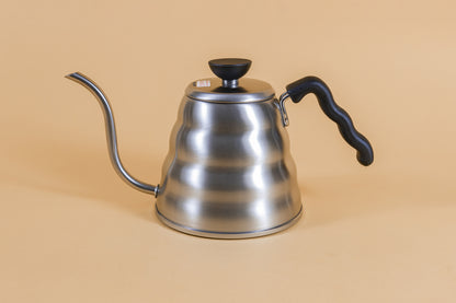 Stainless steel gooseneck kettle and matching lid with plastic knob and black plastic covered handle.
