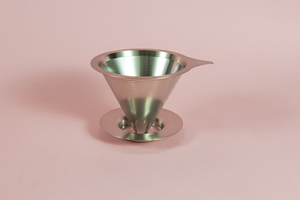 Cone shaped double metal mesh coffee filter with tab and round base.