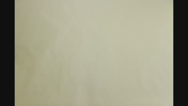 Stop motion video of all black ceramic tapered cupping bowl with inner ridge being filled with ground coffee and then an all black goose neck kettle pours hot water over grounds to fill the cup to the brim. An all black spoon then stirs the top layer of grinds to prepare for cupping tasting.